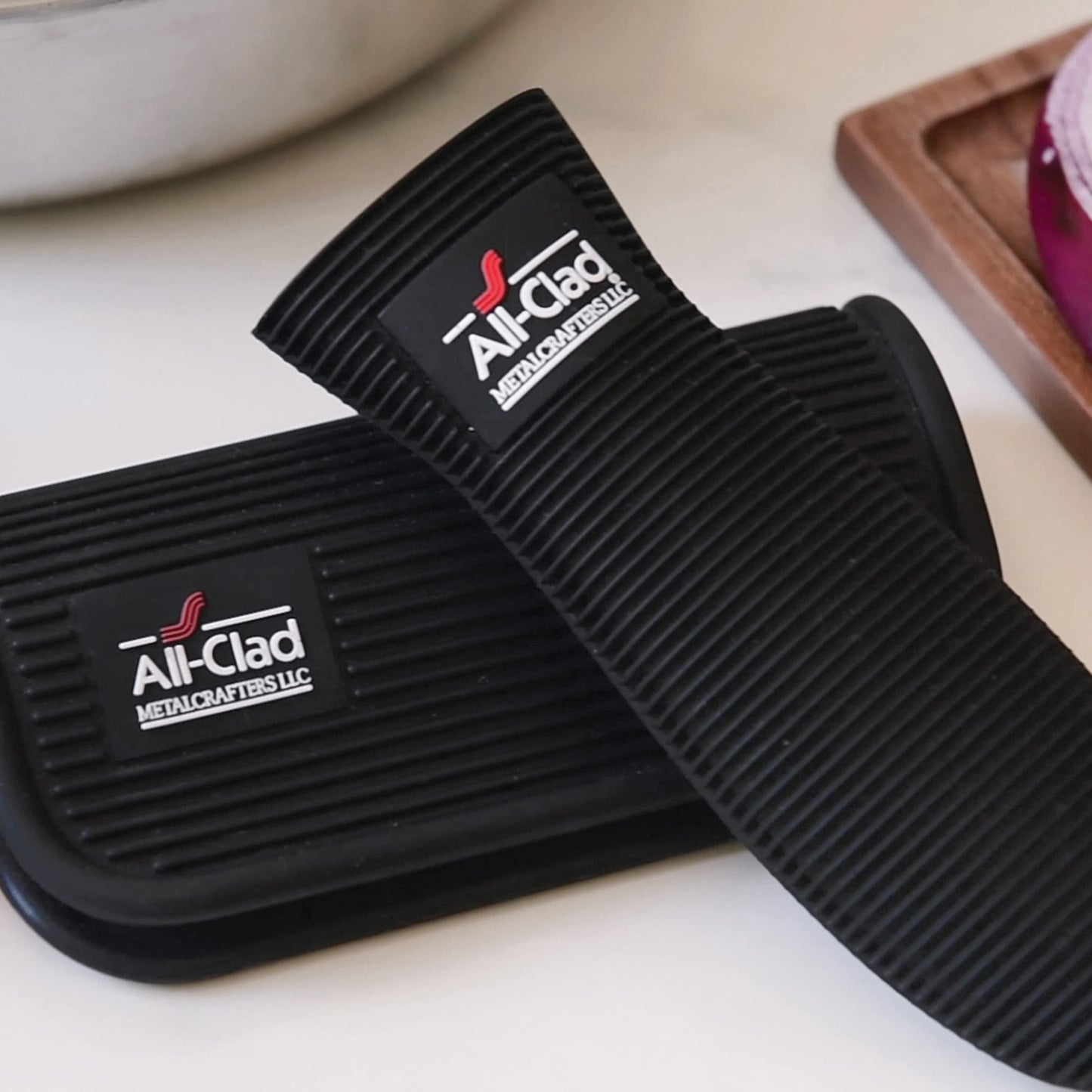 All-Clad Silicone Grip Set: 100% Silicone Flexible & Heat Resistant Ribbed Grip Set - Perfect for Cast Iron, Steel, or Glass, (2-Piece), Black/Grey